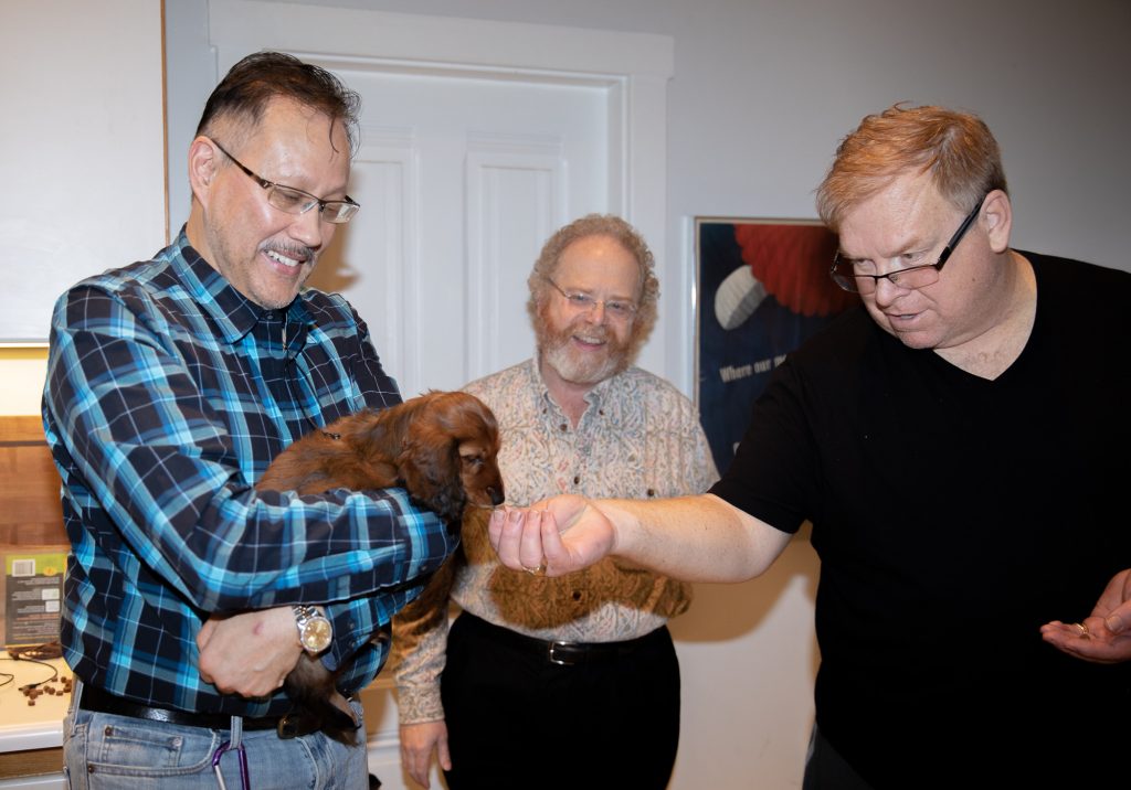 Charles and John (right) make nice to Aurora while Geoffrey looks on