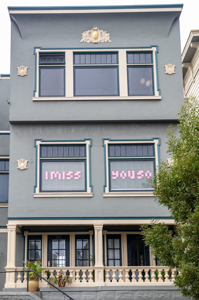 Signs of the Plague - September 19, 2020. "I miss you so" In the windows of a house on Waller at Castro.